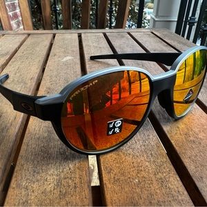 NEW! Oakley Coinflip Prizm Ruby Polarized Lenses, 
Matte Black Camo Frame